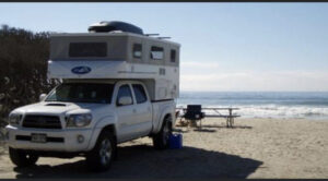 pop up camper by the beach